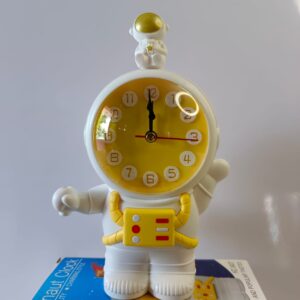 space themed yellow clock