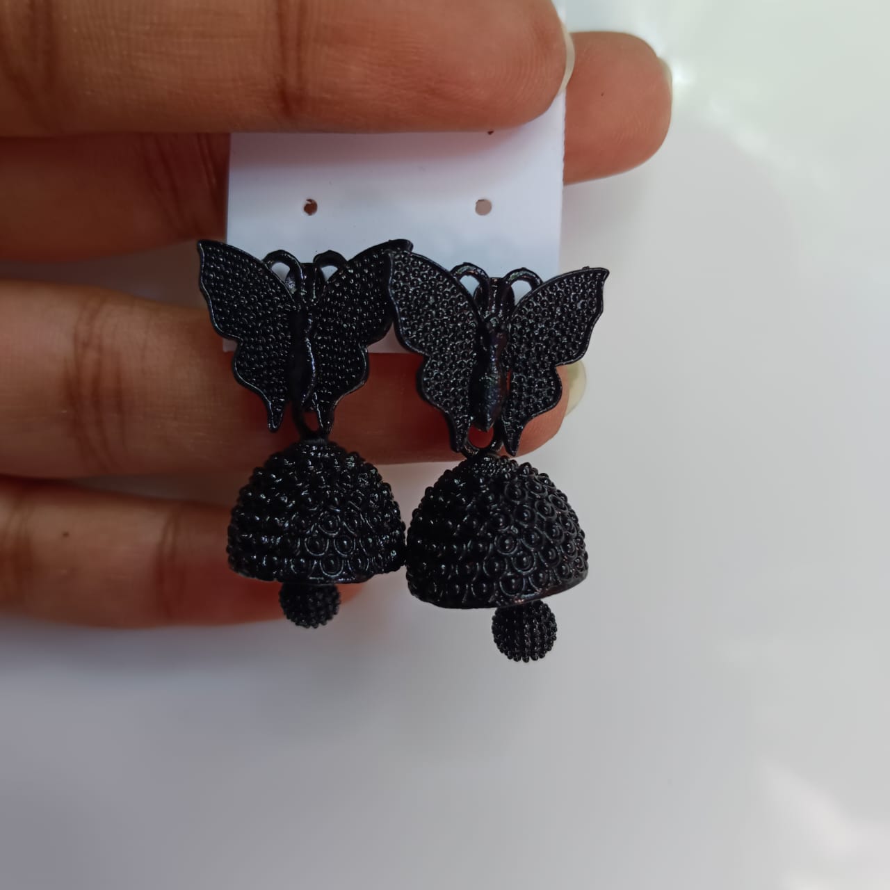 Buy Peach Tassels Butterfly Design Earrings In Black online